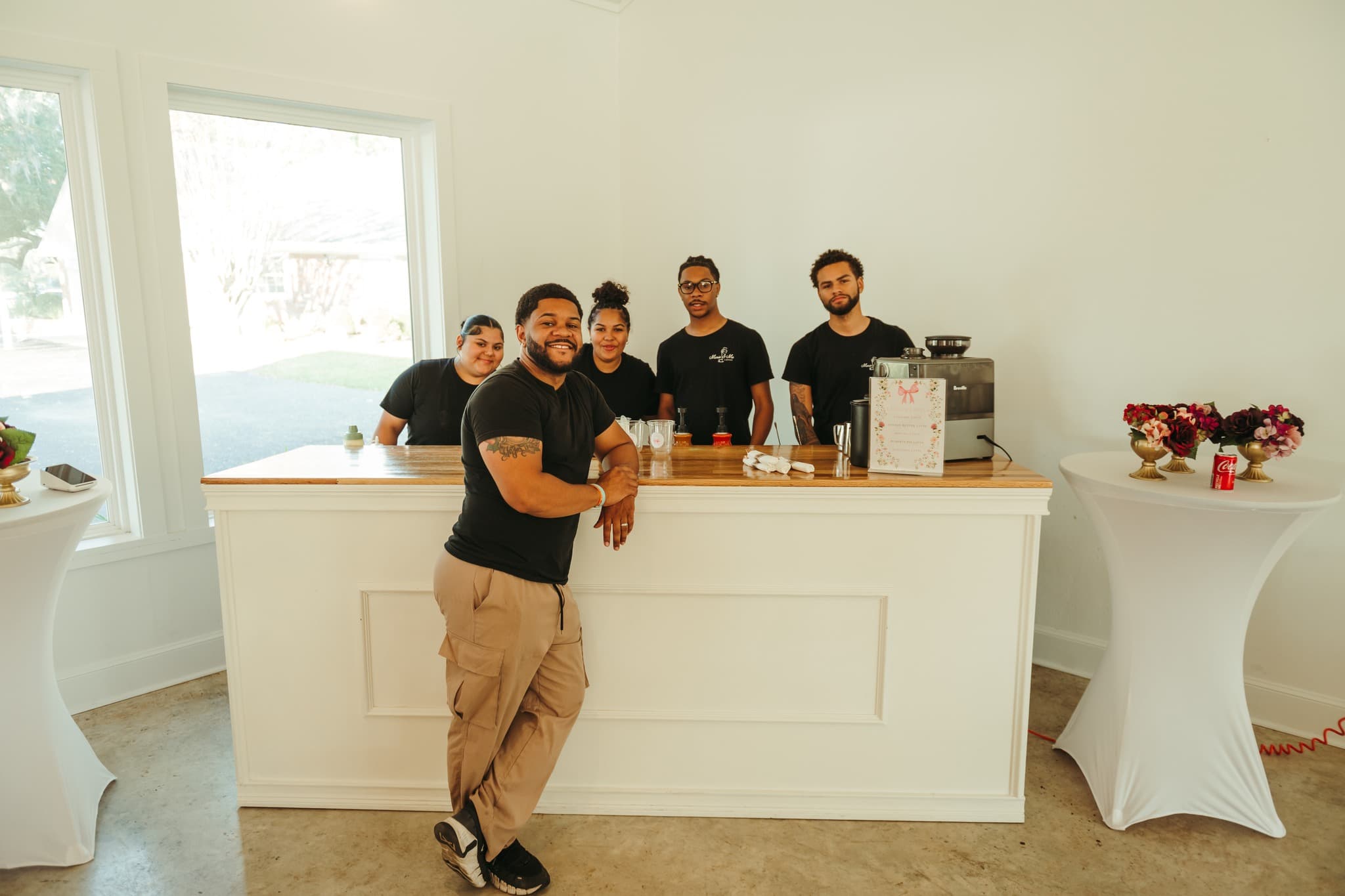 Ray, Brooklynn and the Marie & Me Coffee team behind the bar at a private event
